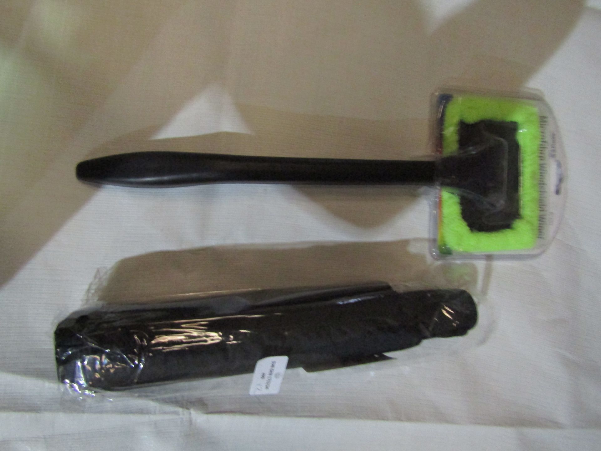 2 X items Being 1 X Black Brolley & 1 X Microfibre Windshield Wiper Both Unchecked &m Packaged