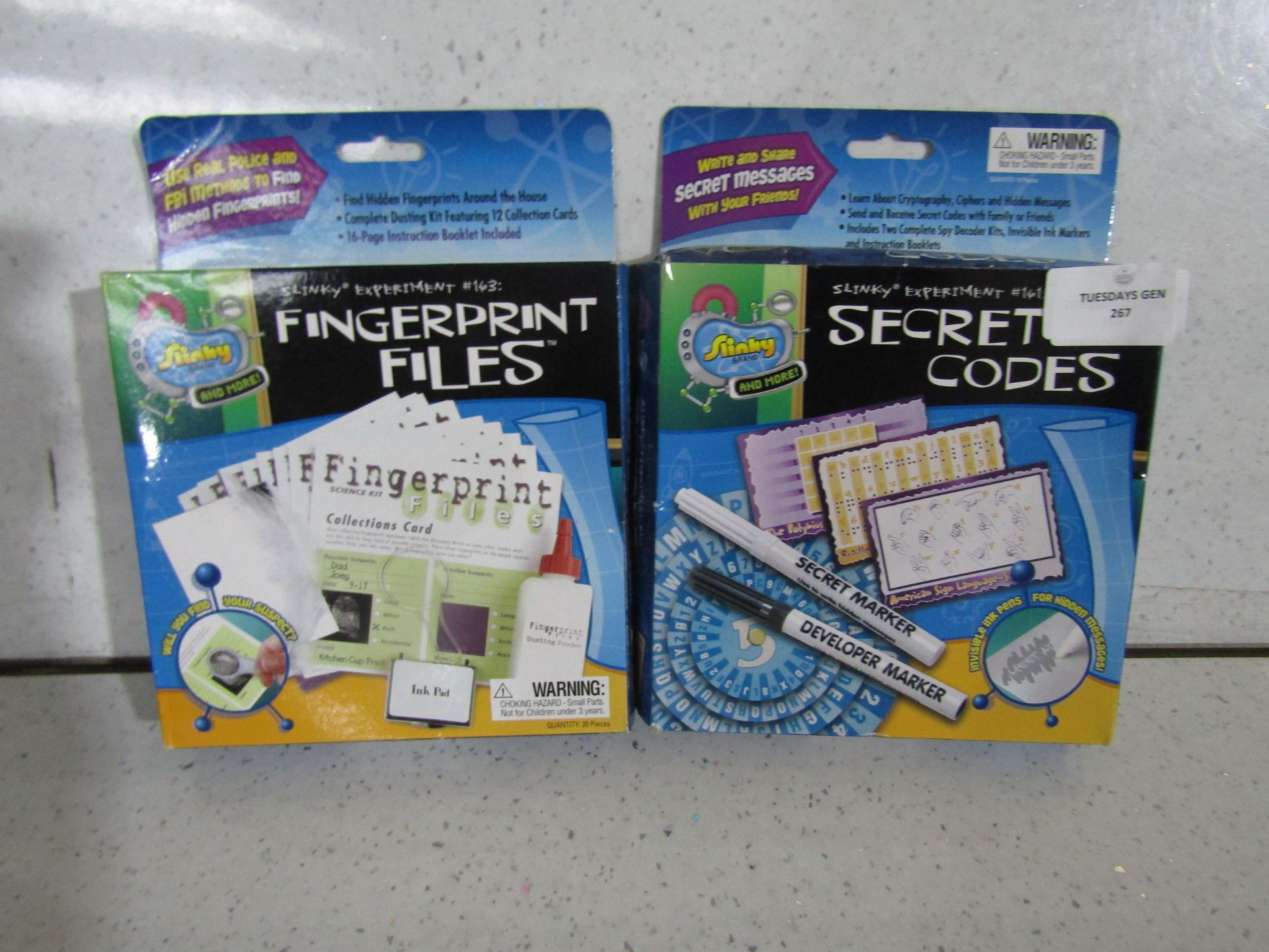 1x Slinky - Secret Code Experiment Set - Boxed. 1x Slinky - Fingerprint Files Experiment Set -