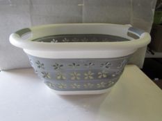 Collapseable Plastic Wash Basket - Good Condition & Packaged.