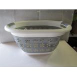 Collapseable Plastic Wash Basket - Good Condition & Packaged.