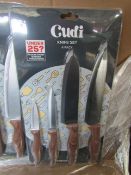 Cudi 4 piece knife set with wood effect handles - New & Still blister Packed - Over 18's Only!