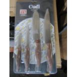 Cudi 4 piece knife set with wood effect handles - New & Still blister Packed - Over 18's Only!