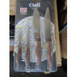 Cudi 4 piece knife set with wood effect handles - New & Still blister Packed - Over 18's Only!