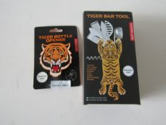 1x Kikkerland - Tigar Bar Tool - Boxed. 1x 1x Kikkerland - Tigar Bottle Opener - Packaged.