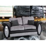 2 Seater grey and Black sofa, looks in good condition upon quick inspection