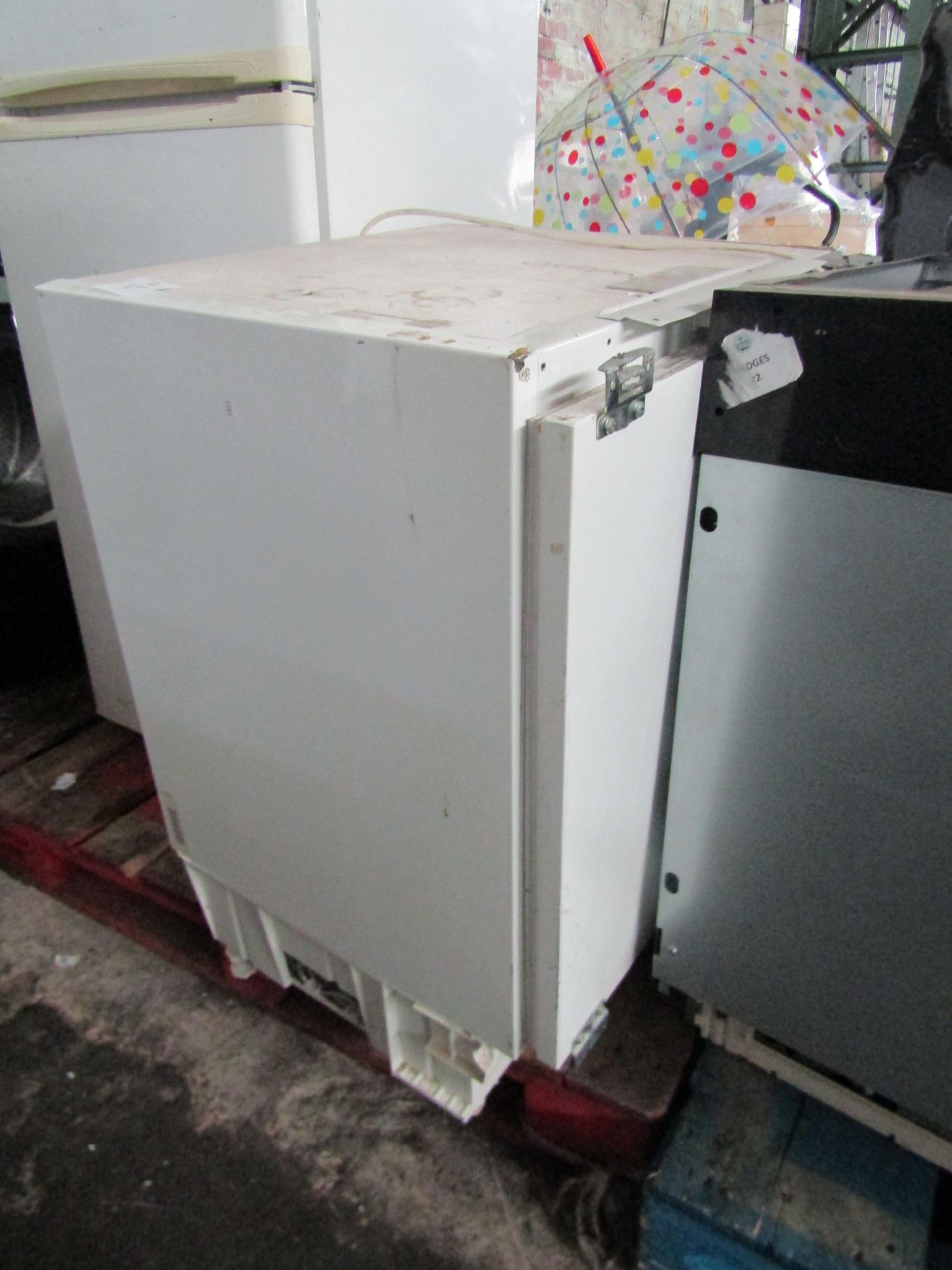 Intergrated Fridge. Powers on but does not get cold. Need Intensive Clean. May Contains Dints