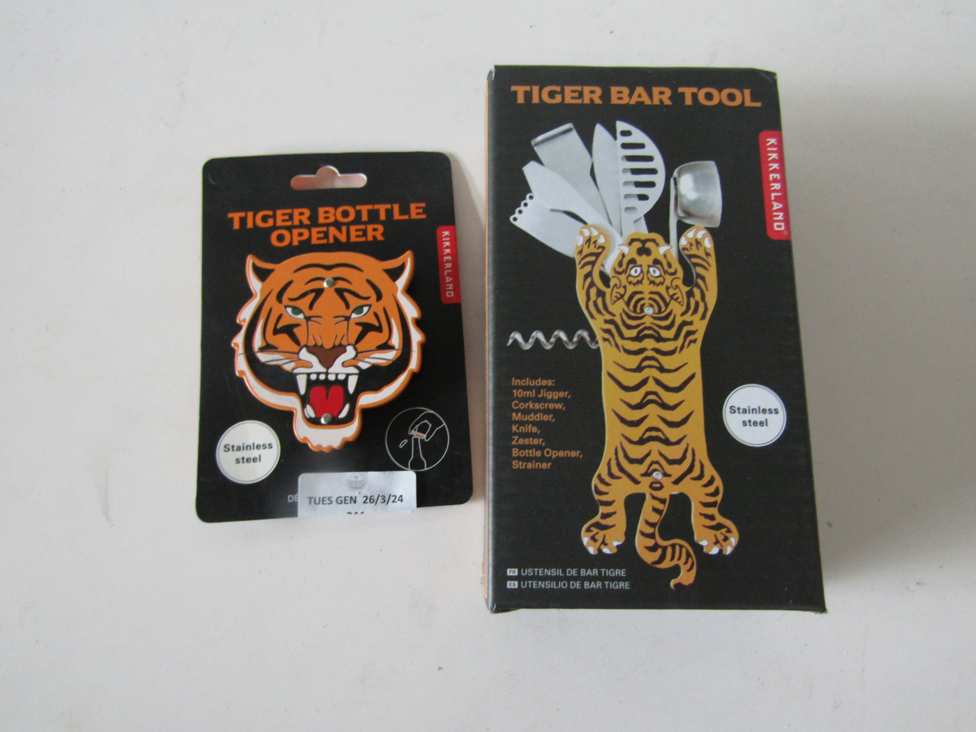 1x Kikkerland - Tigar Bar Tool - Boxed. 1x 1x Kikkerland - Tigar Bottle Opener - Packaged.