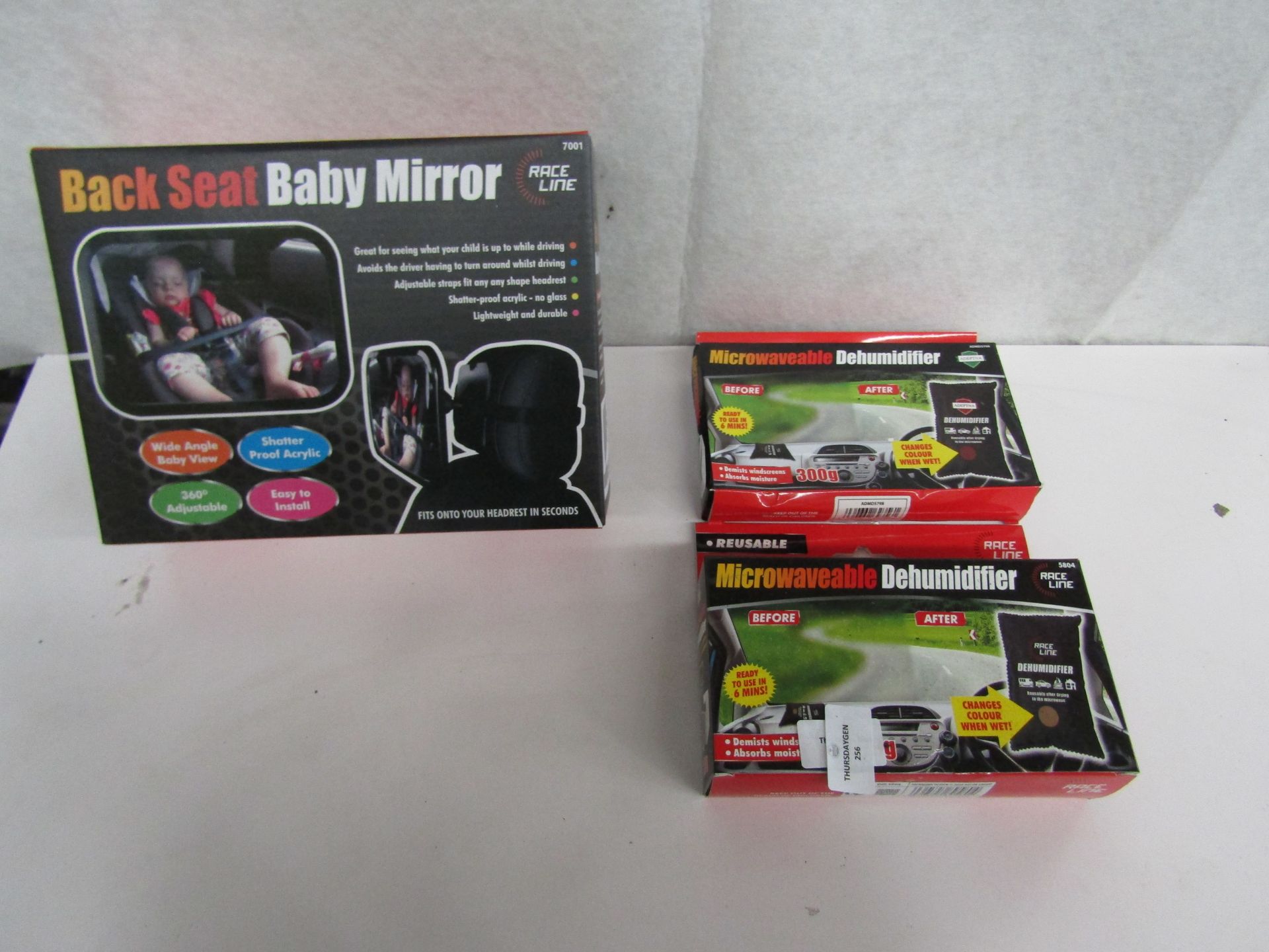 2x Race Line - Microwaveable Dehumidifer - Boxed. 1x RaceLine - Backseat Baby Mirror - Unchecked &