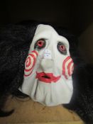 Saw Fancy Dress Mask, May Contain Scuufs & Has A Slight Tear On The Back, No Package.