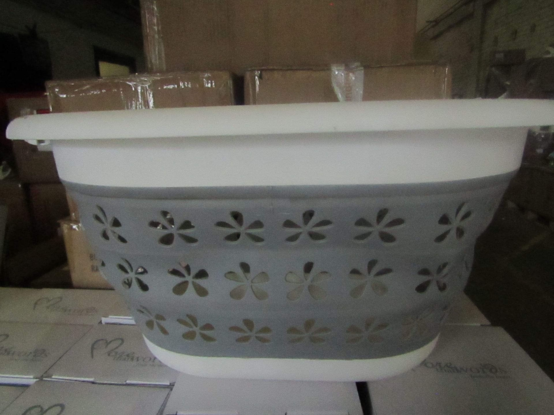 Collapseable Plastic Wash Basket - Good Condition & Packaged.