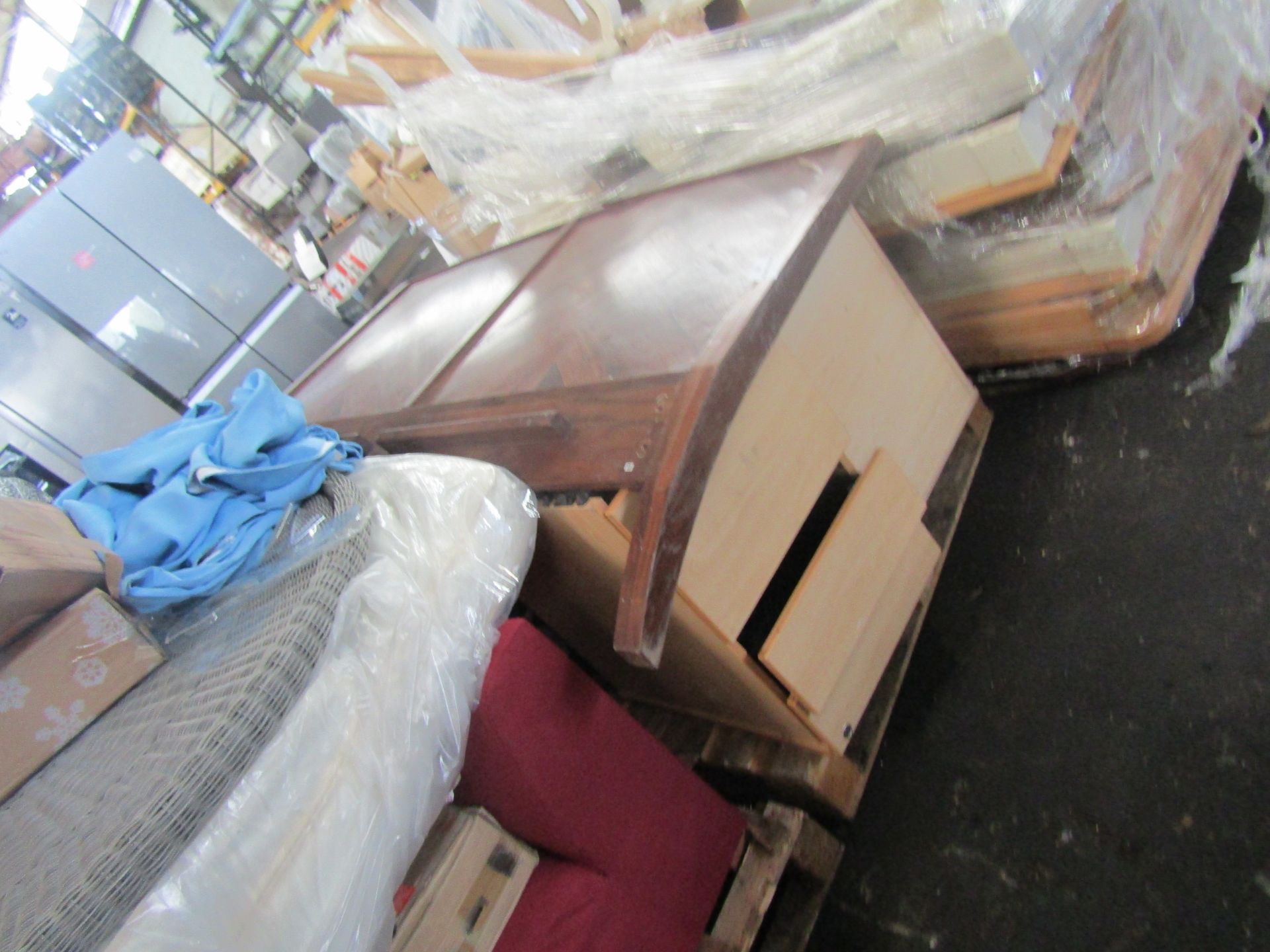 Pallet of unmanifested & unchecked various furniture parts incl filling cabinets.
