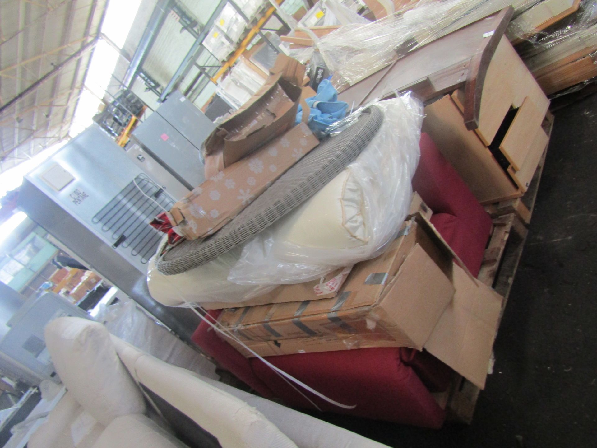 Pallet of unmanifested John Lewis customer furniture parts. Unchecked by us