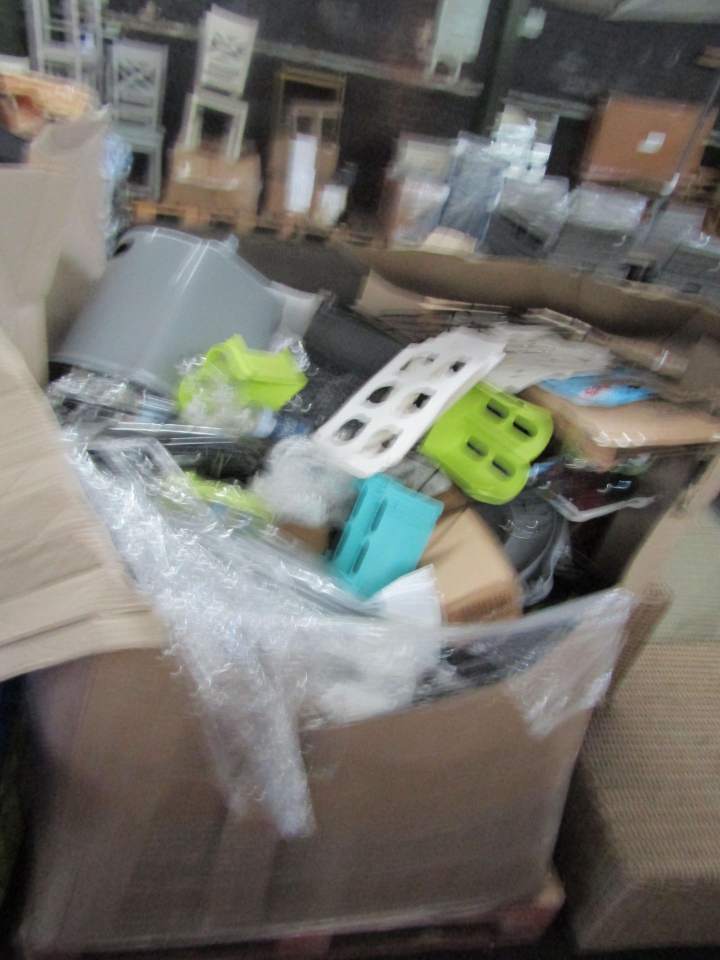 Pallet of online returns, most are either faulty or missing a part