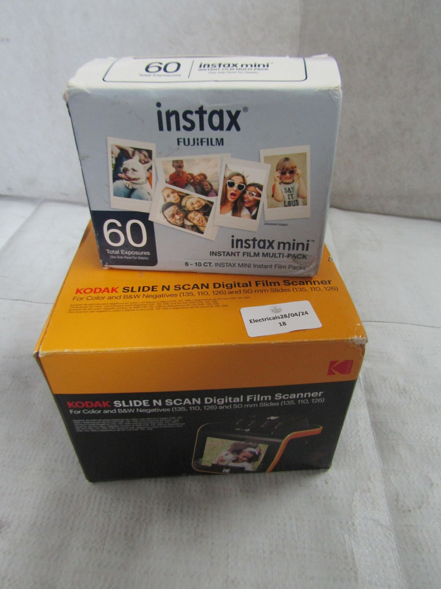 2x Items Being - 1x Kodak Slide N Scan Digital Film Scanner - 1x Instax Mini Instant Film Multi-Pack