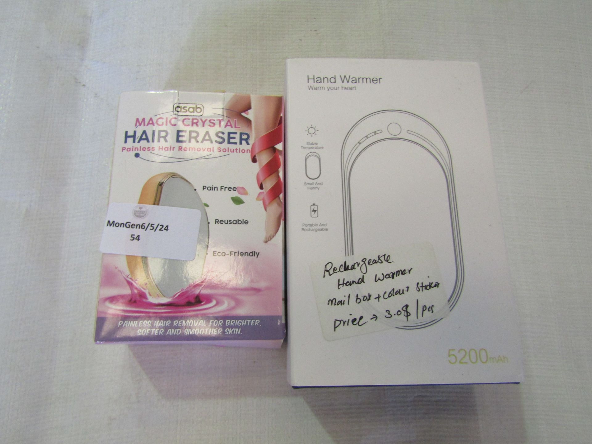2x Items Being - 1x Asab Magic Crystal Hair Eraser - 1x 5200mAh Hand Warmer - Both Unchecked &