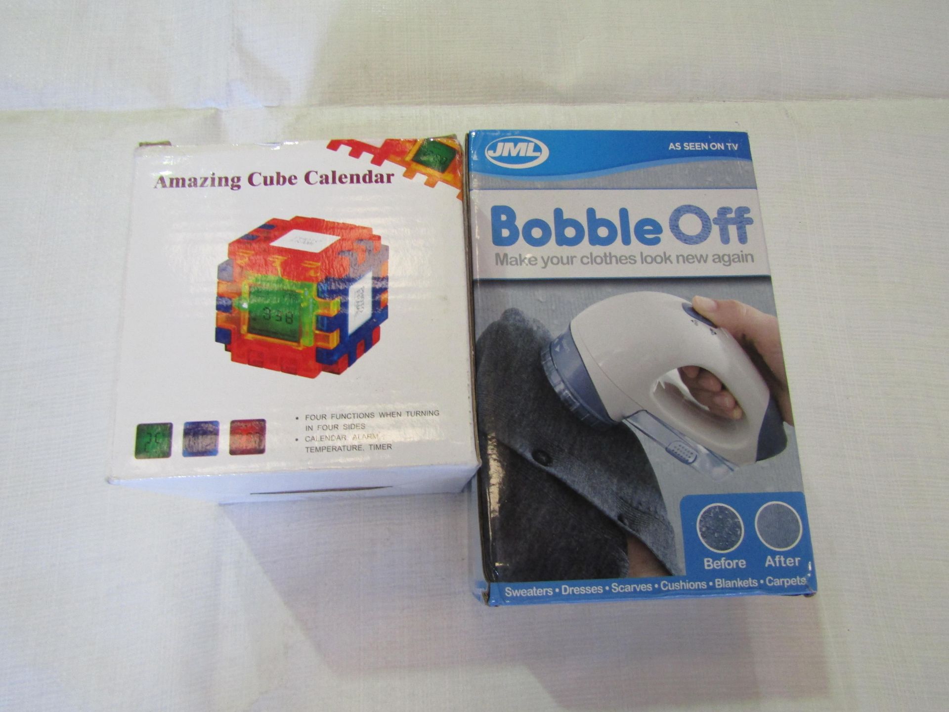 2x Items Being - 1x JML Bobble Off Make Your Clothes Look New Again - 1x Amazing Cube Calender -