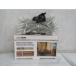 10X LIGHTNUM - 306 LED Curtain Lights / Warm White / 8 Lighting Modes / 3M x 3M - Boxed.