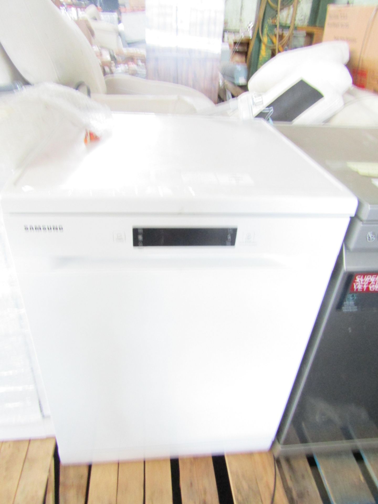 Samsung - White Dishwasher- Powers On, Needs A Clean Inside, Not Tested Any Further. May Contain