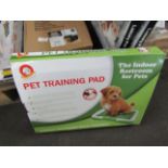 Pet training pad, unchecked and boxed