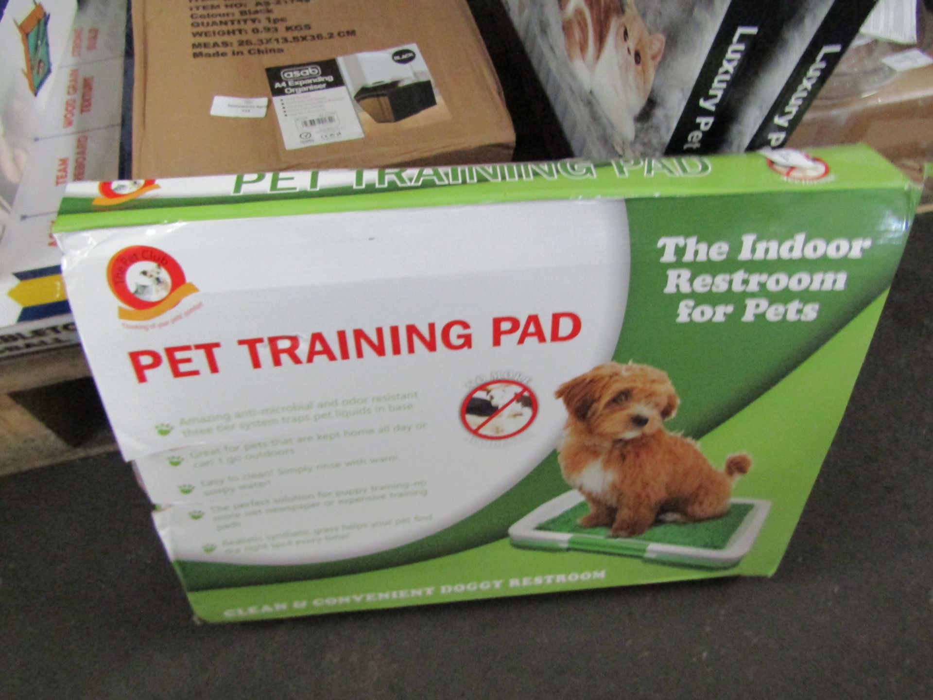 Pet training pad, unchecked and boxed