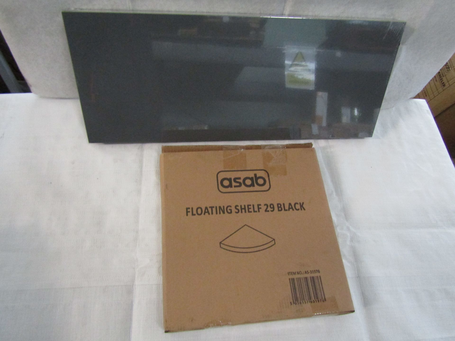 1x Asab - Black Floating Corner Shelf - Boxed. 1x Asab - Grey Floating Shelf 60cm - Packaged.