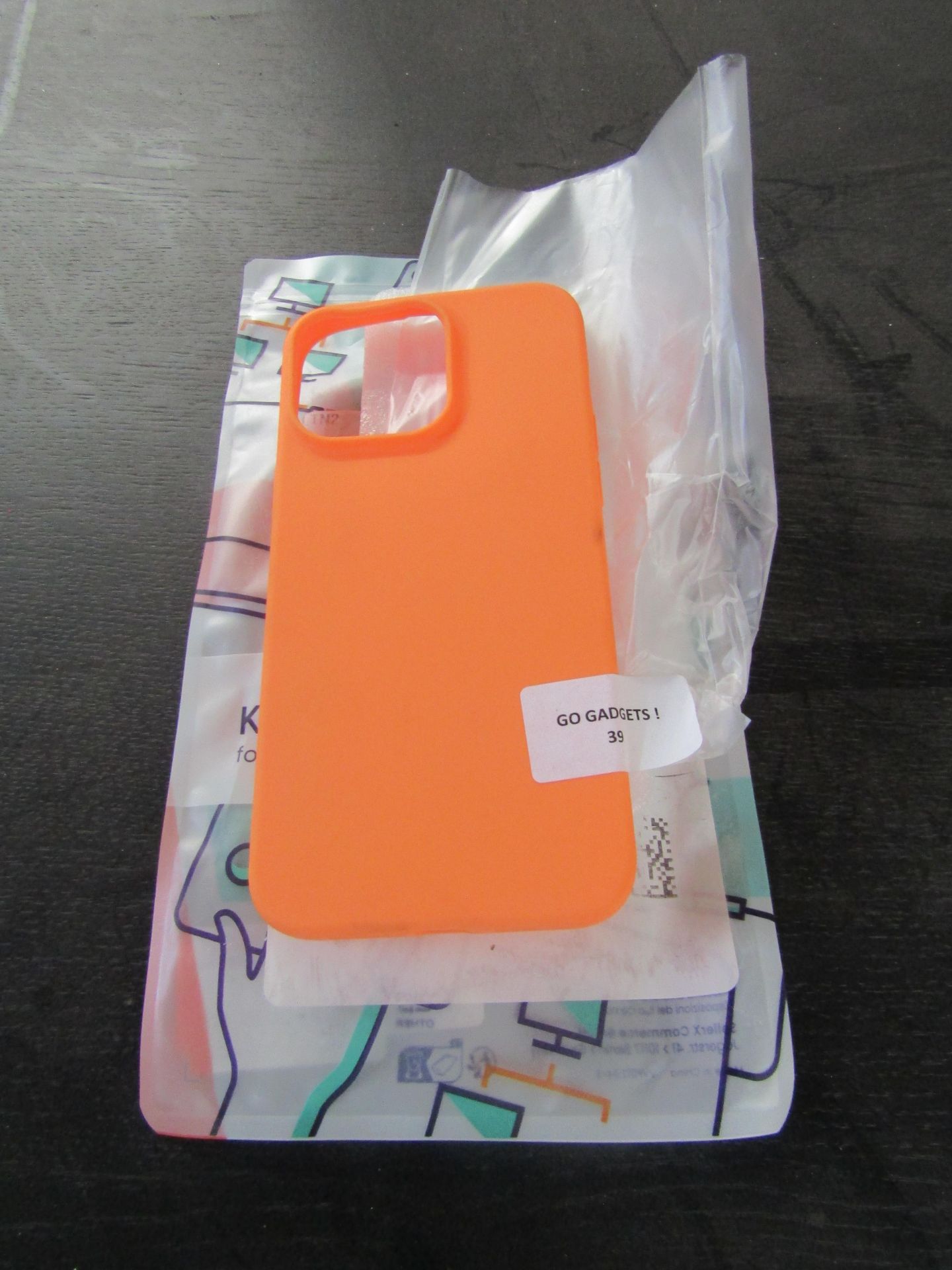 iPhone 6.7" Orange Rubber Case - Good Condition May Be Slightly Dirty.
