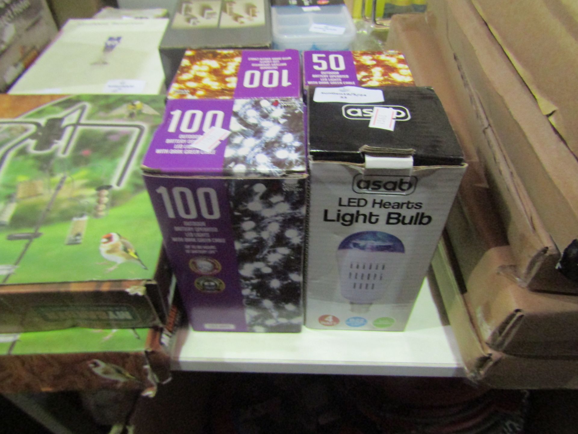 3x Items Being - 3x Boxes Of Outdoor Battery Operated Led Lights - 1x Asab Led Hearts Light Bulb -