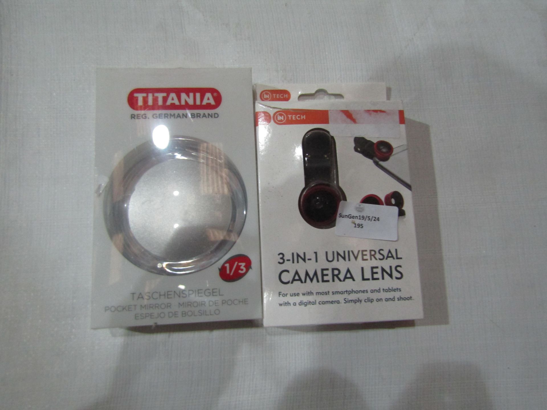 2x Items Being - 1x Universal 3-in1 Camera Lens, 1x Titania Pocket Mirror, Unchecked & Boxed.