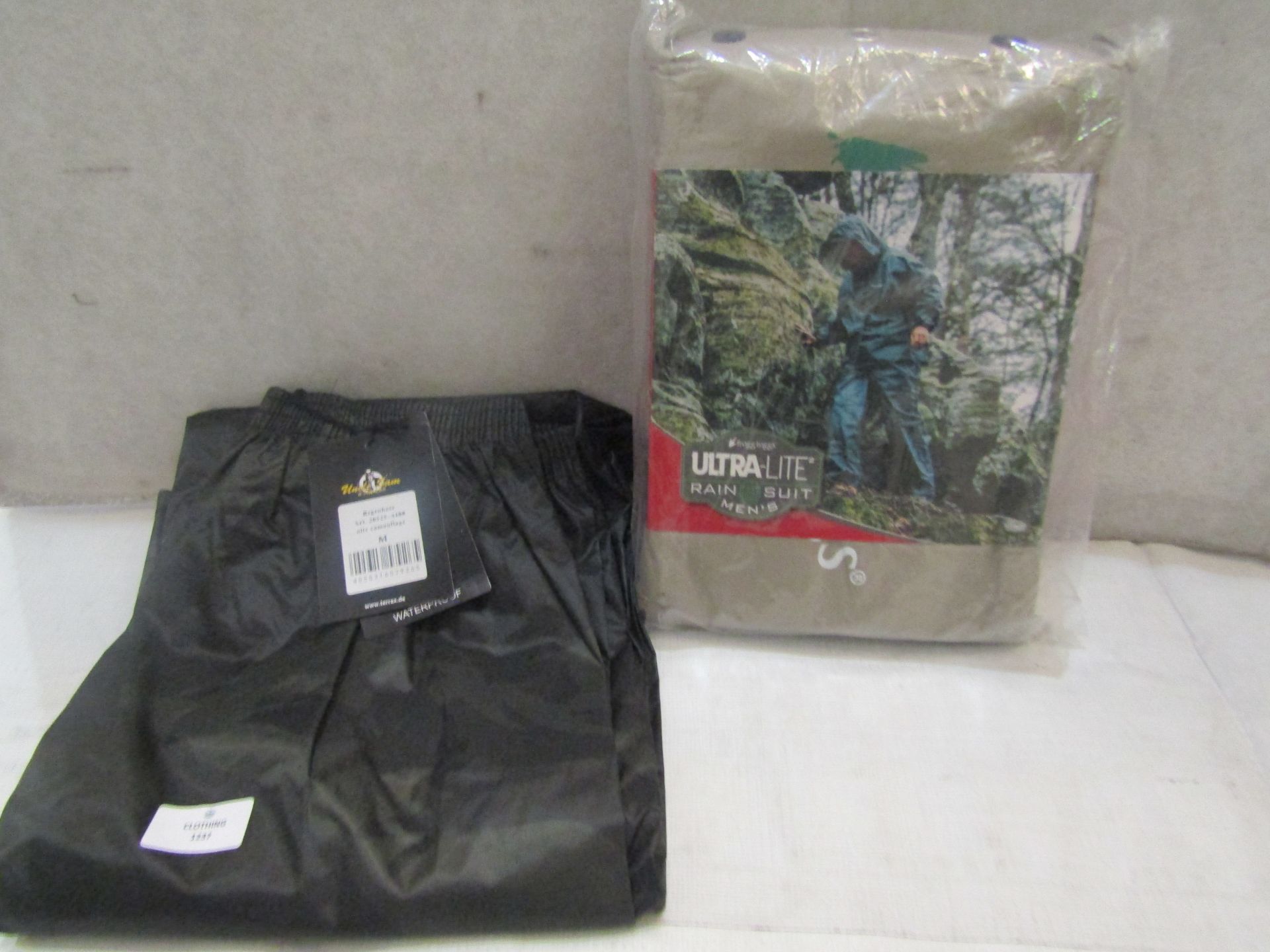 2 X Items Being 1 X Ultra-Lite Rain Suit X/L & 1 X Pair of Uncle Sams Waterproof Pants Size M Both