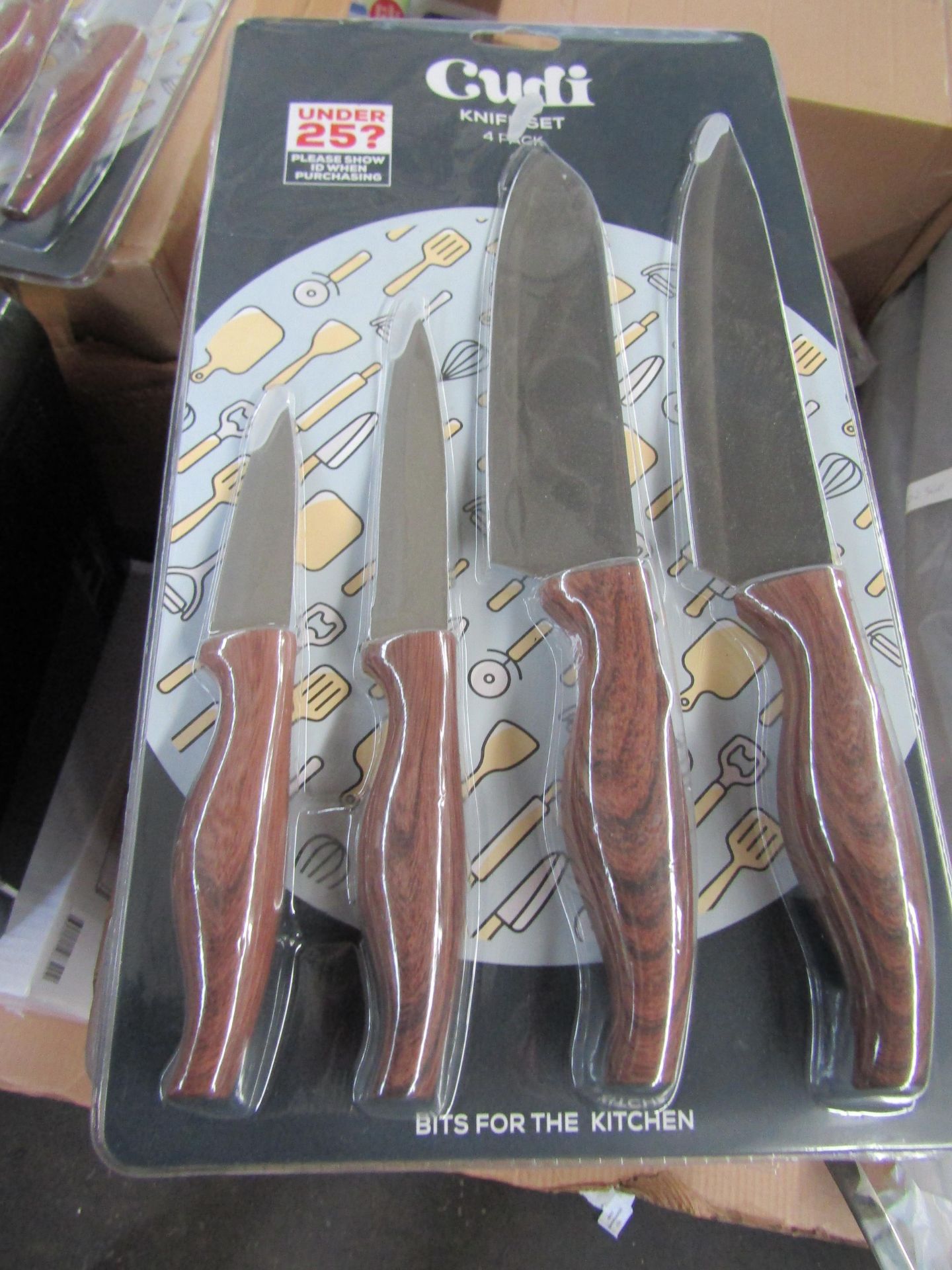 Cudi 4 piece knife set with wood effect handles - New & Still blister Packed - Over 18's Only!