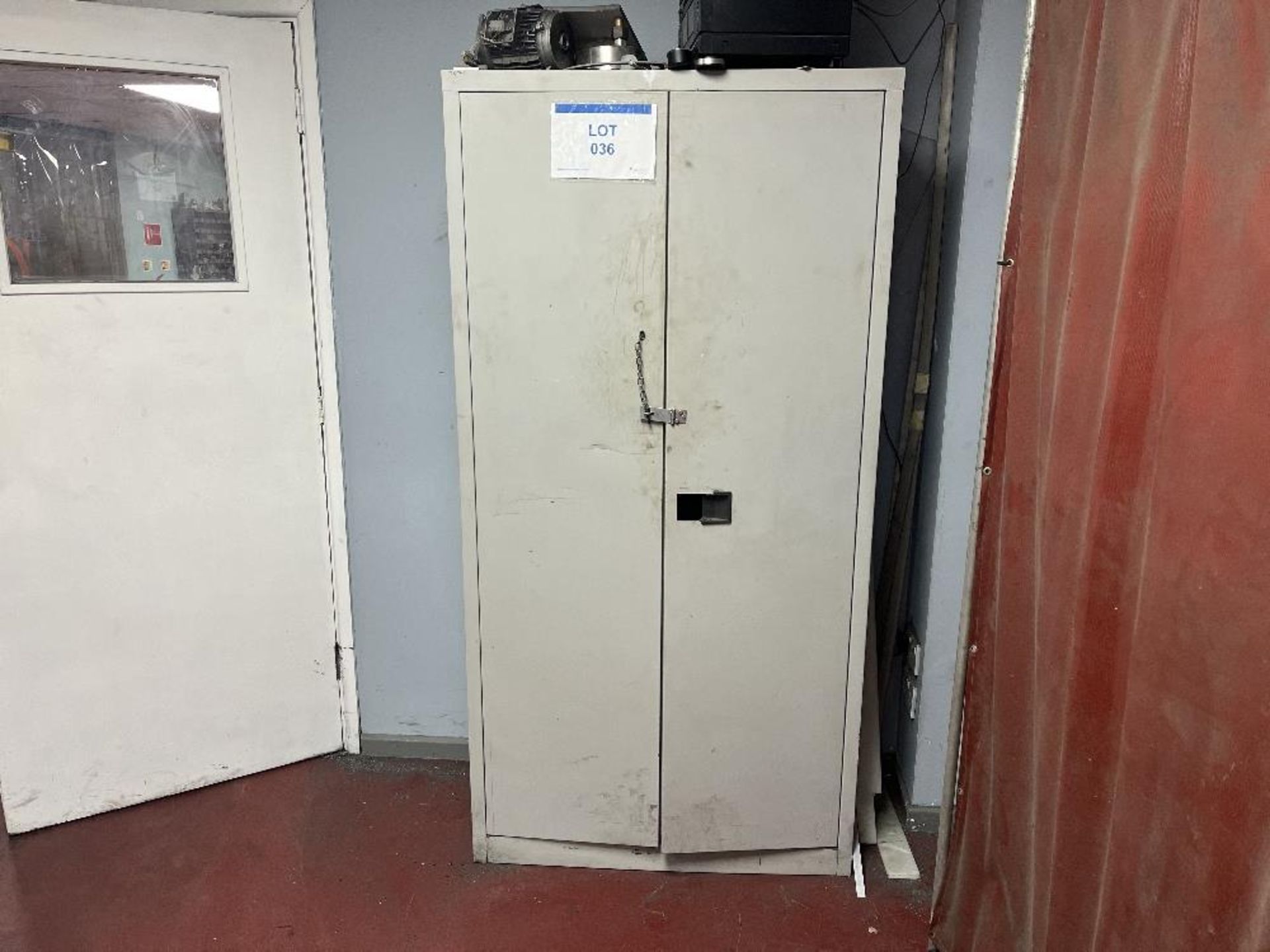 Steel cupboard with contents