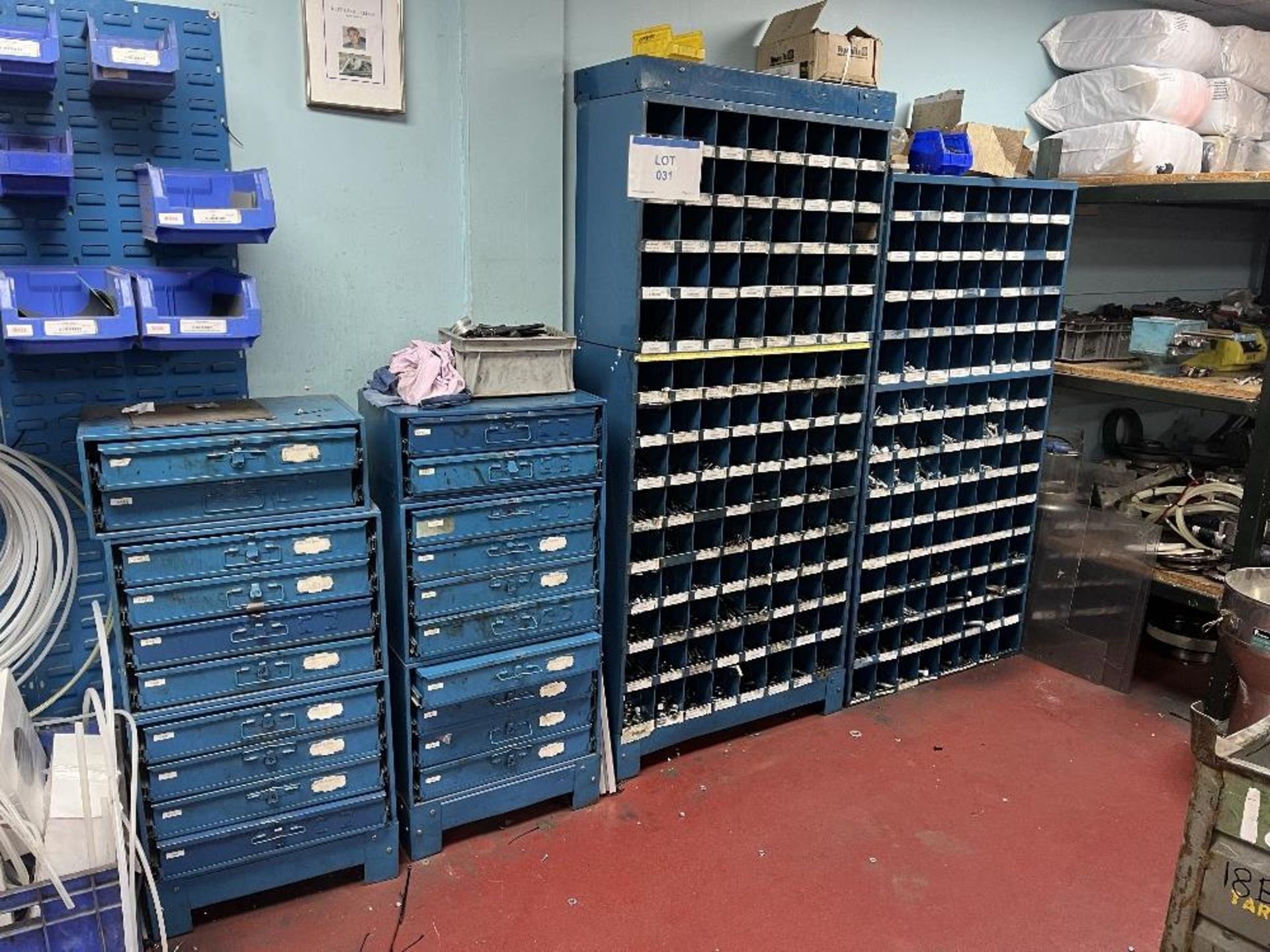 (6) steel drawer units and (3) steel racks with contents of fixings