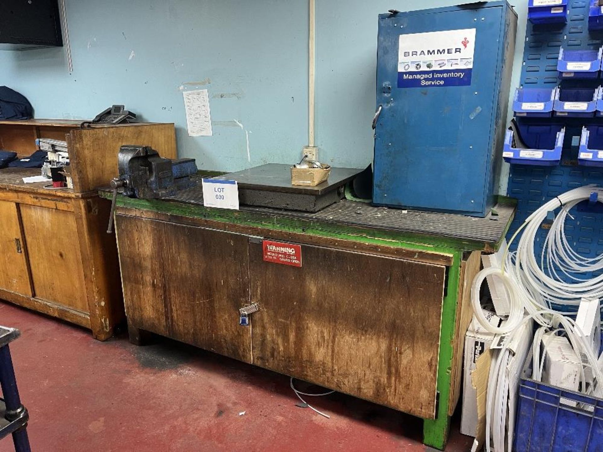 Wooden bench with fitted record 25 vice and a steel surface