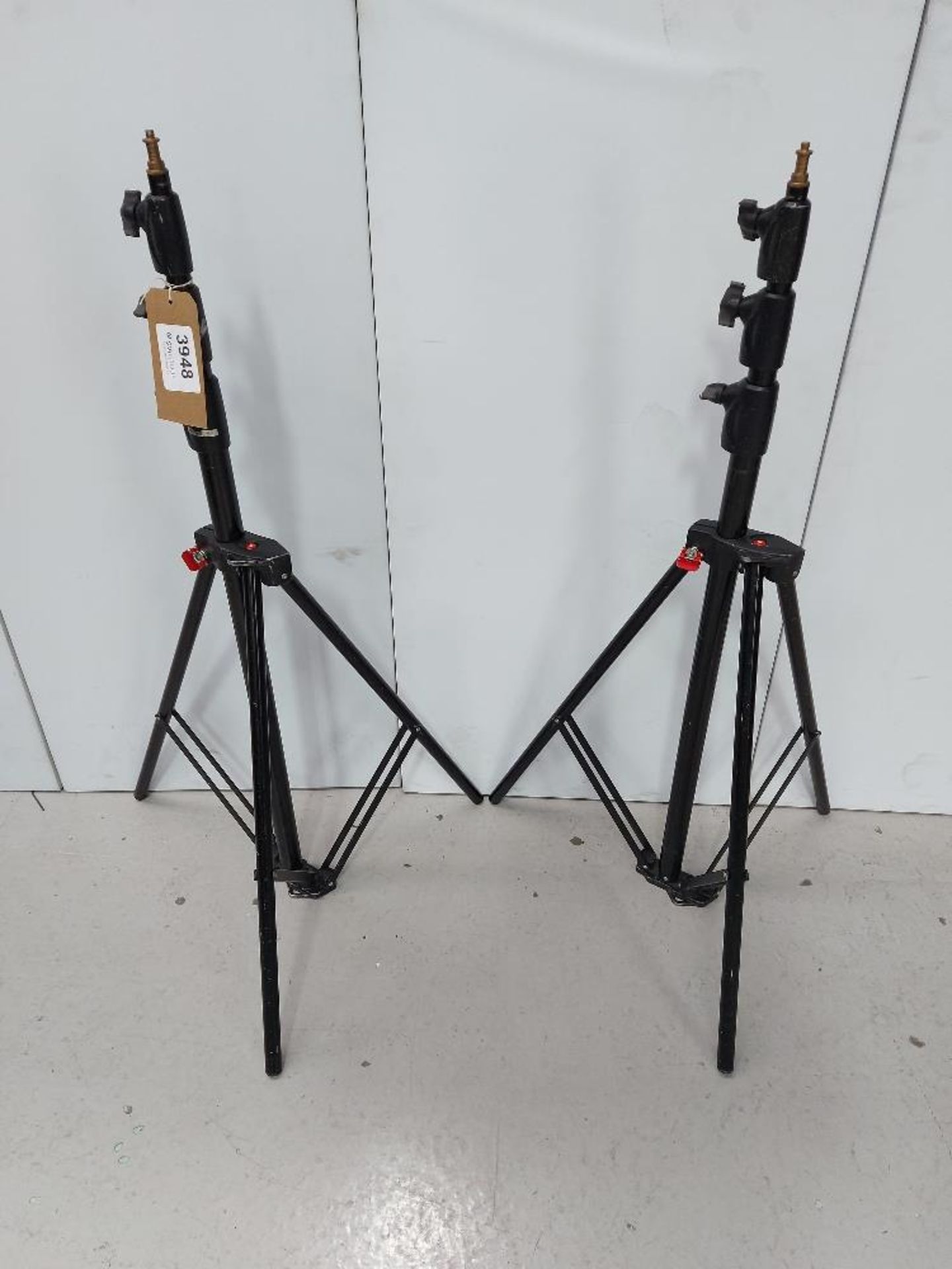 (2) Manfrotto 1004BAC Medium Triple Riser Lighting Stands