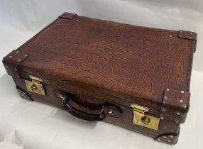 A Large Crocodile Skin Suitcase/Trunk Bearing the Initials A.C.G.