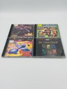 Four Amiga CD32 games, Striker; Super Putty; The Chaos Engine; Whale's Voyage