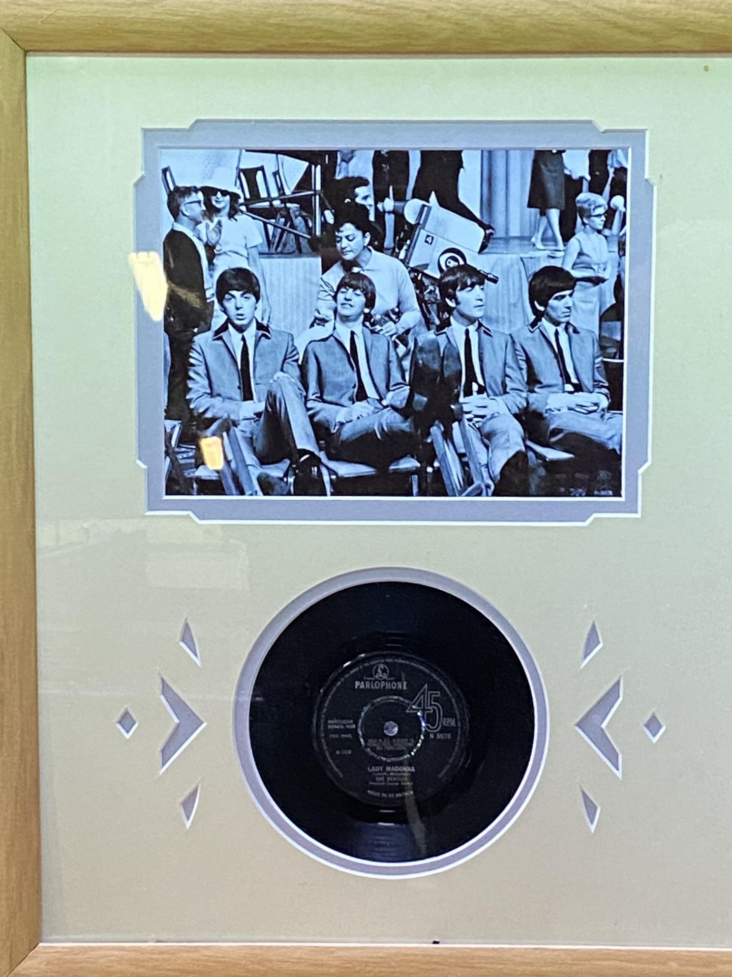 Framed and glazed Beatles single; together with a limited edition Beatles film cell and photographs - Image 2 of 3