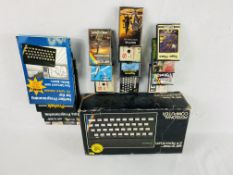 Sinclair 48K ZX Spectrum together with a quantity of games and two programming books.