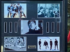 Framed and glazed Beatles single; together with a limited edition Beatles film cell and photographs