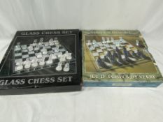 Two boxed glass chess sets
