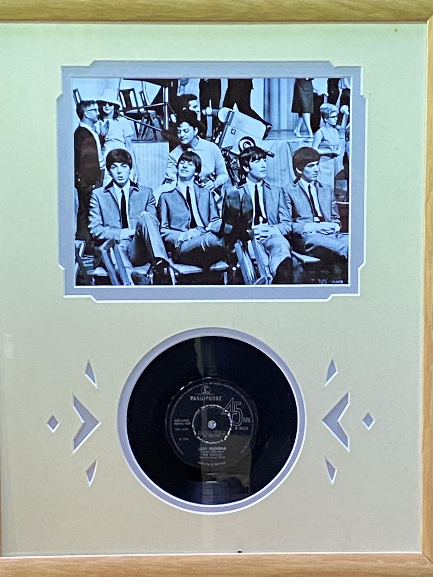 Framed and glazed Beatles single; together with a limited edition Beatles film cell and photographs - Image 3 of 3