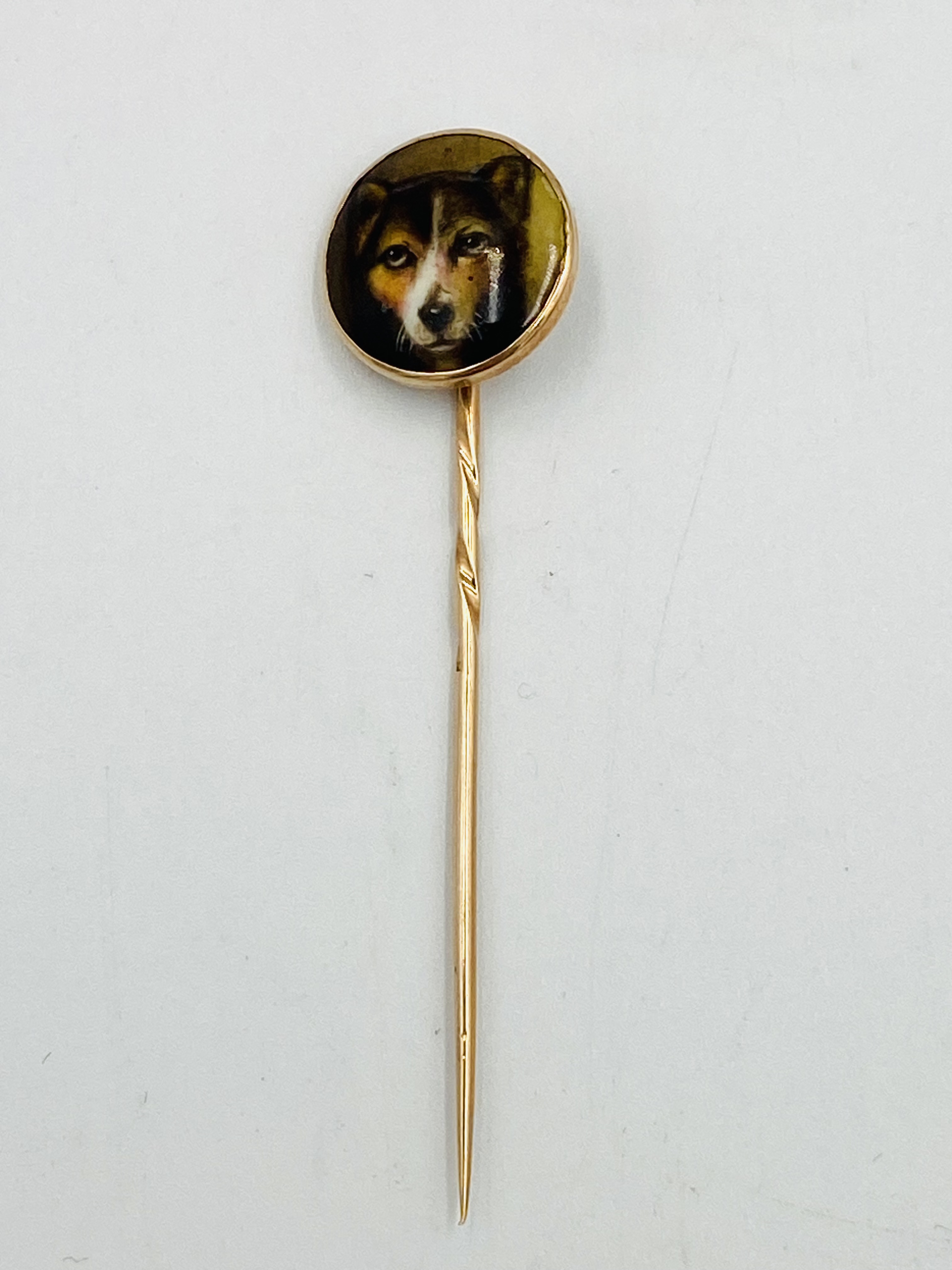 William Essex yellow metal stick pin