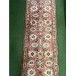 Red ground wool runner