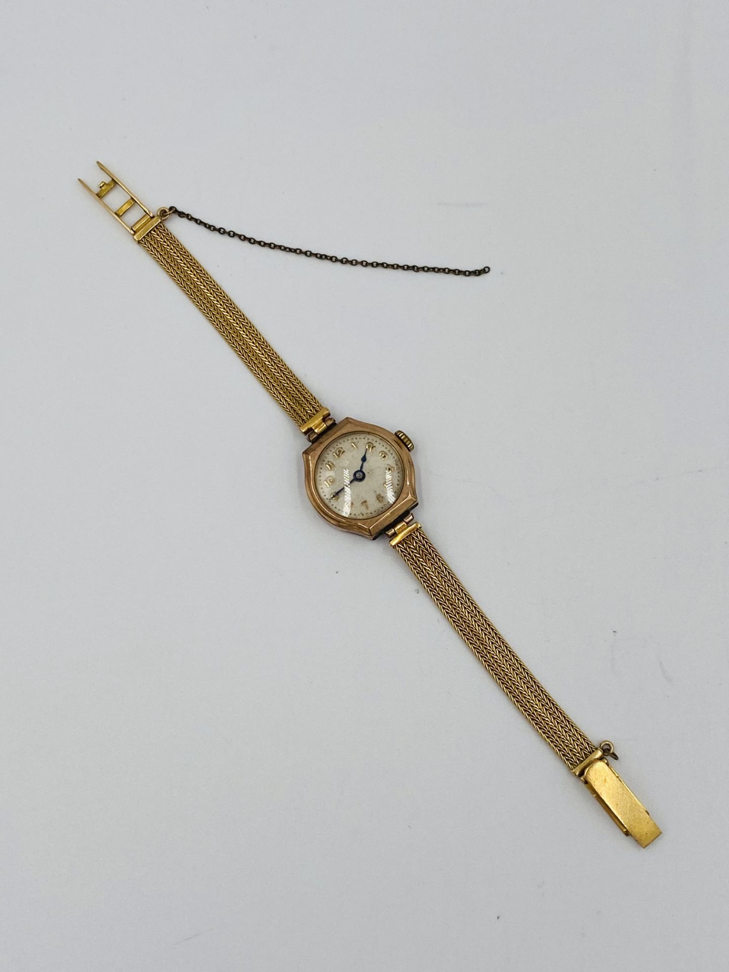 Ladies wristwatch on 18ct gold strap