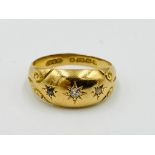 18ct gold ring set with a diamond