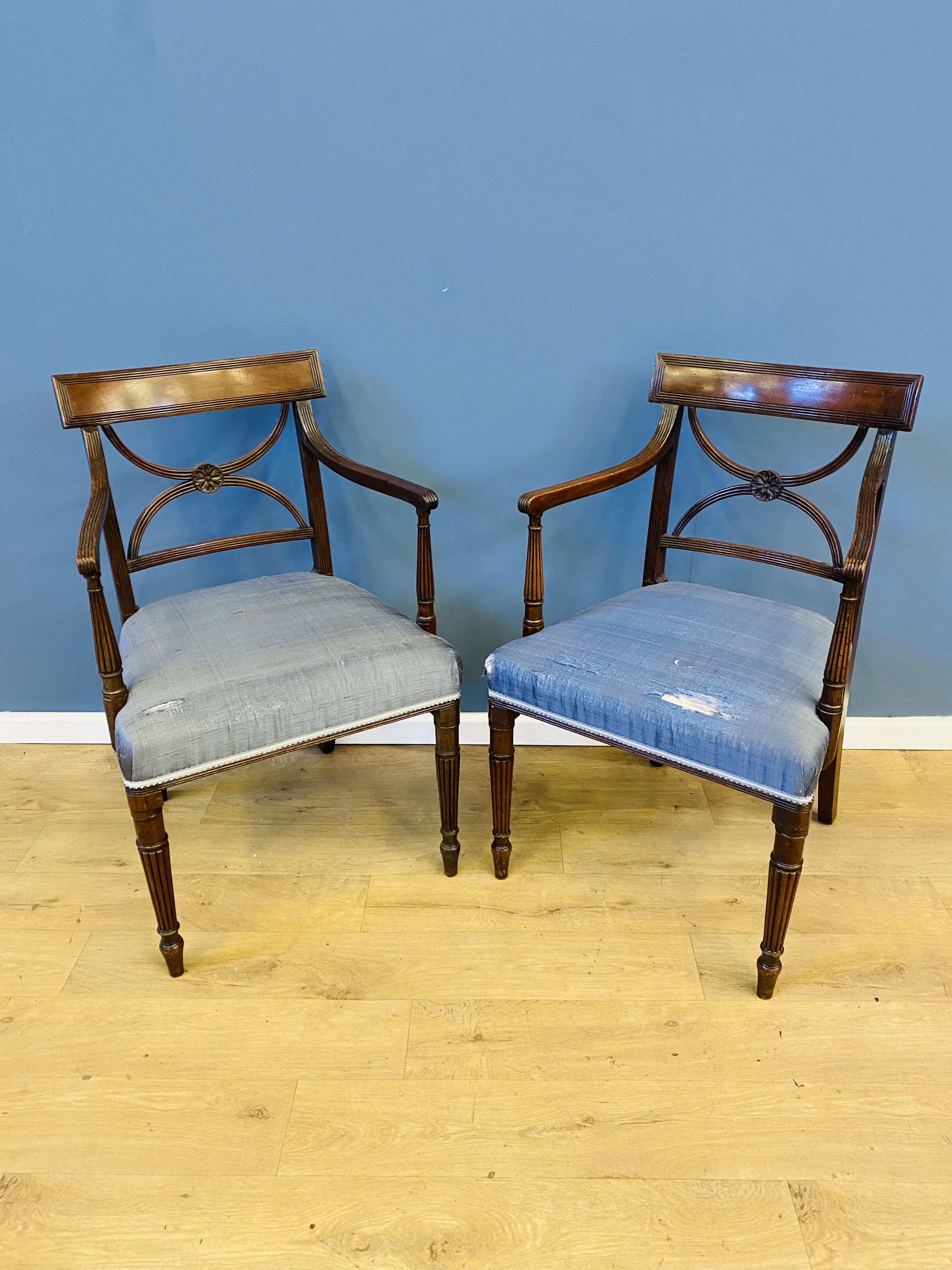 Pair of mahogany open armchairs