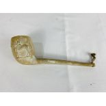 A clay pipe decorated with a jockey and racehorse, written to side Donovan and F Archer