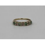 9ct gold ring set with emeralds