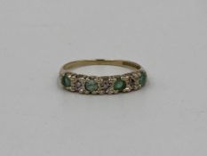 9ct gold ring set with emeralds