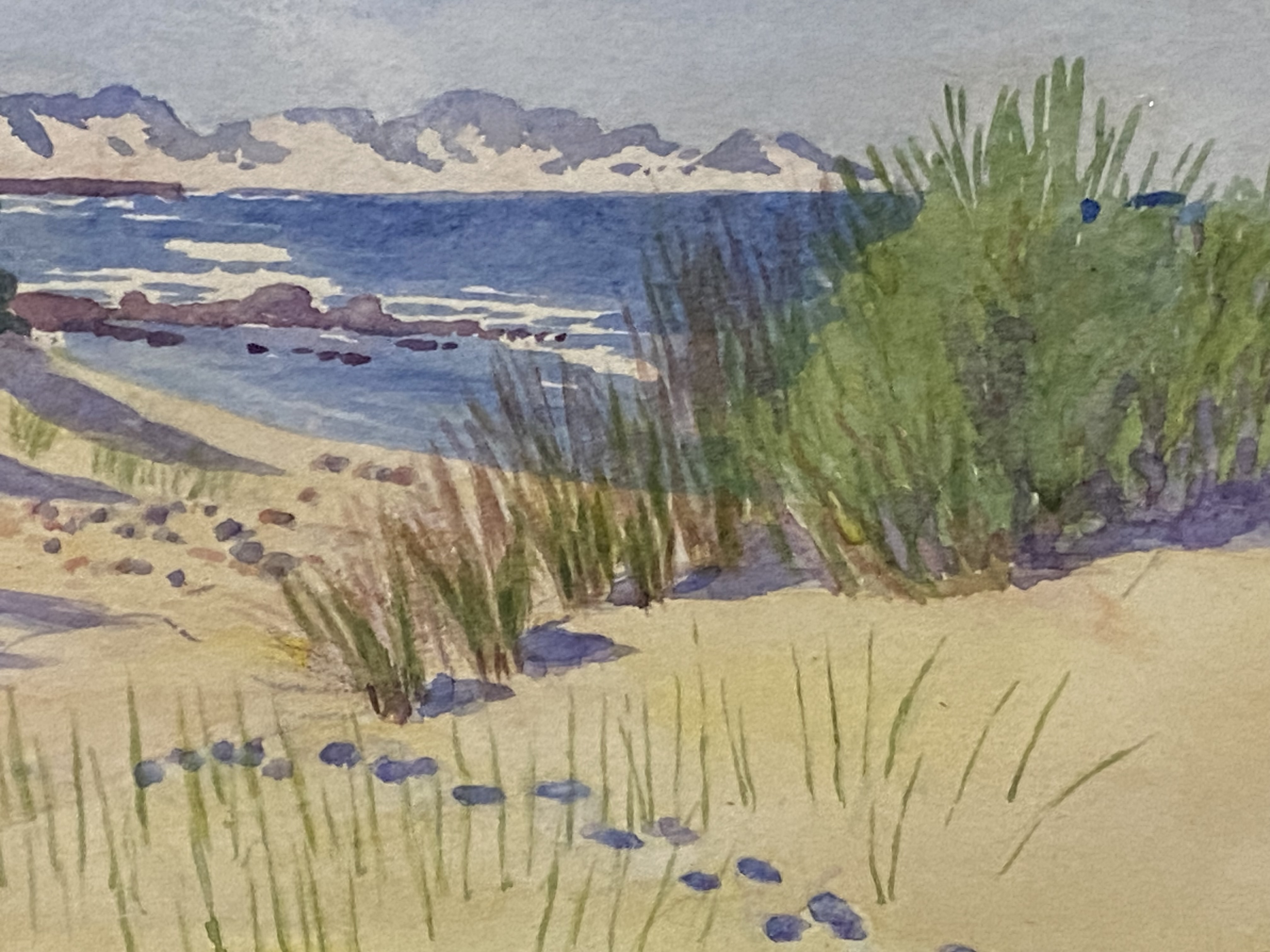 Framed and glazes watercolour of a beach initialed NTG